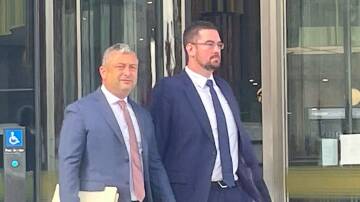 Lawyer Kamy Saeedi, left, with Michael James McGoogan, 37, right, outside the ACT Magistrates Court. Picture by Lanie Tindale